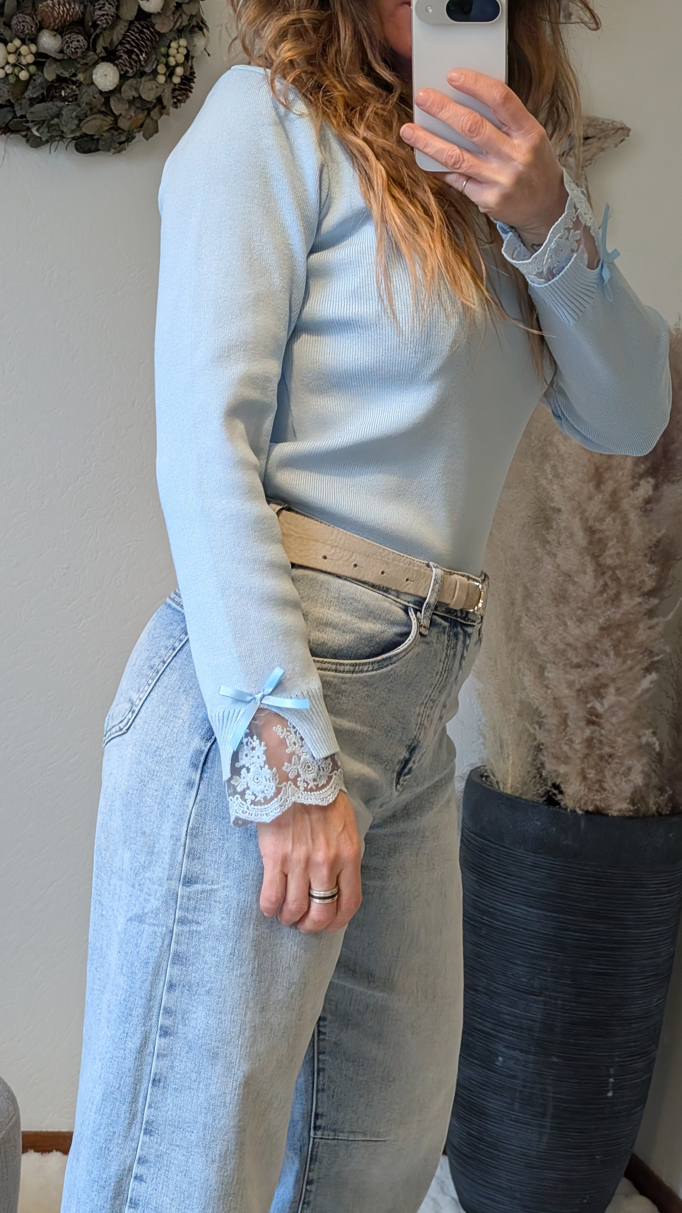 Fijn gebreide trui met kanten details