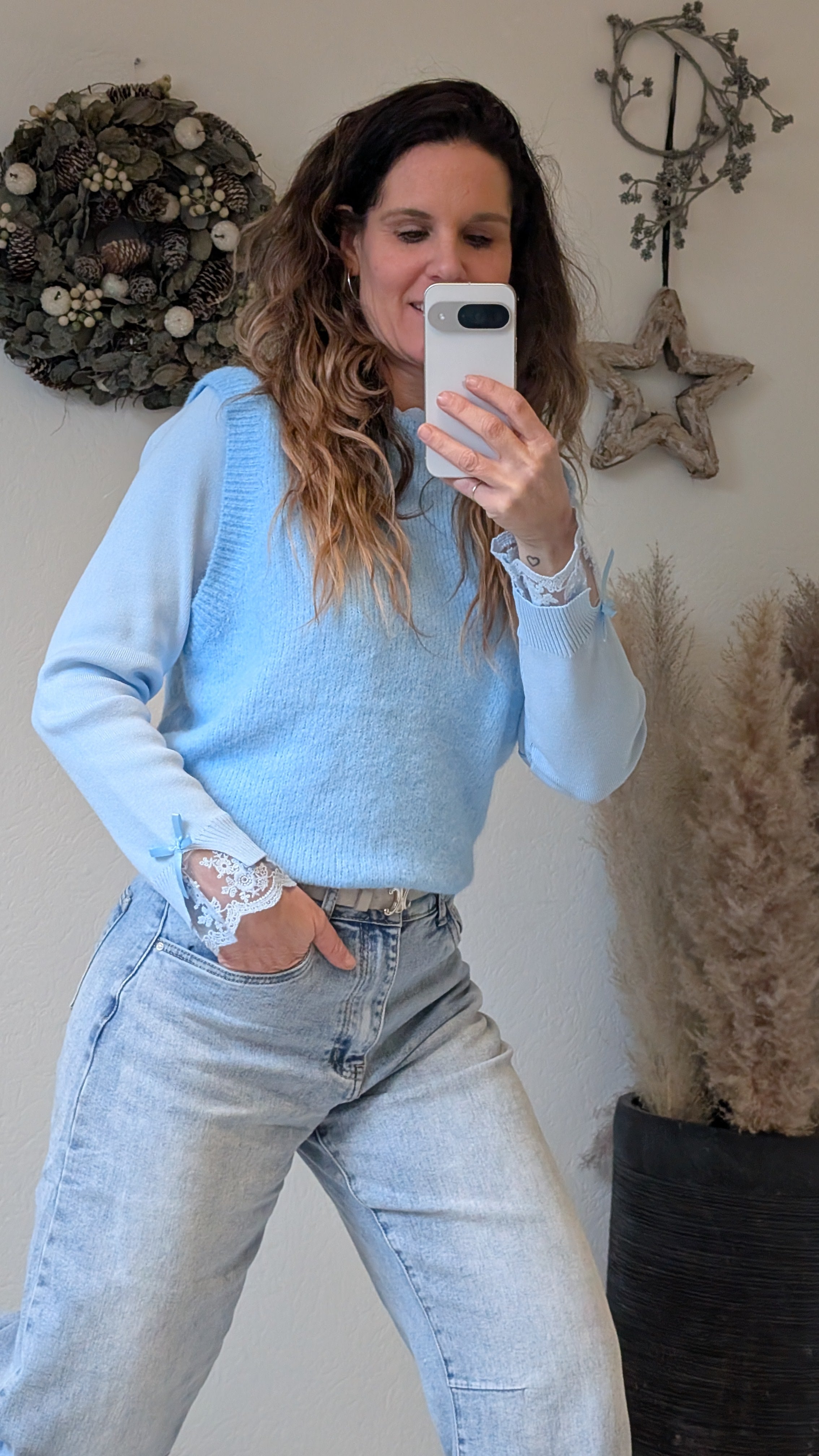 Lichtblauwe gebreide dames spencer